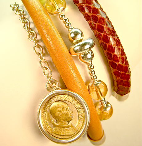 4) Old coins (each unique) set in sterling silver, in combination with the finest napa leather, snakeskin and beads of Citrine.